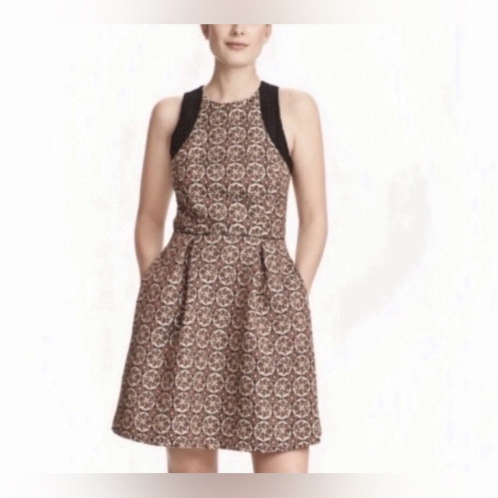 H&M Jacquard Racerback Textured
Cocktail Dress w/ Pockets size 8 like new